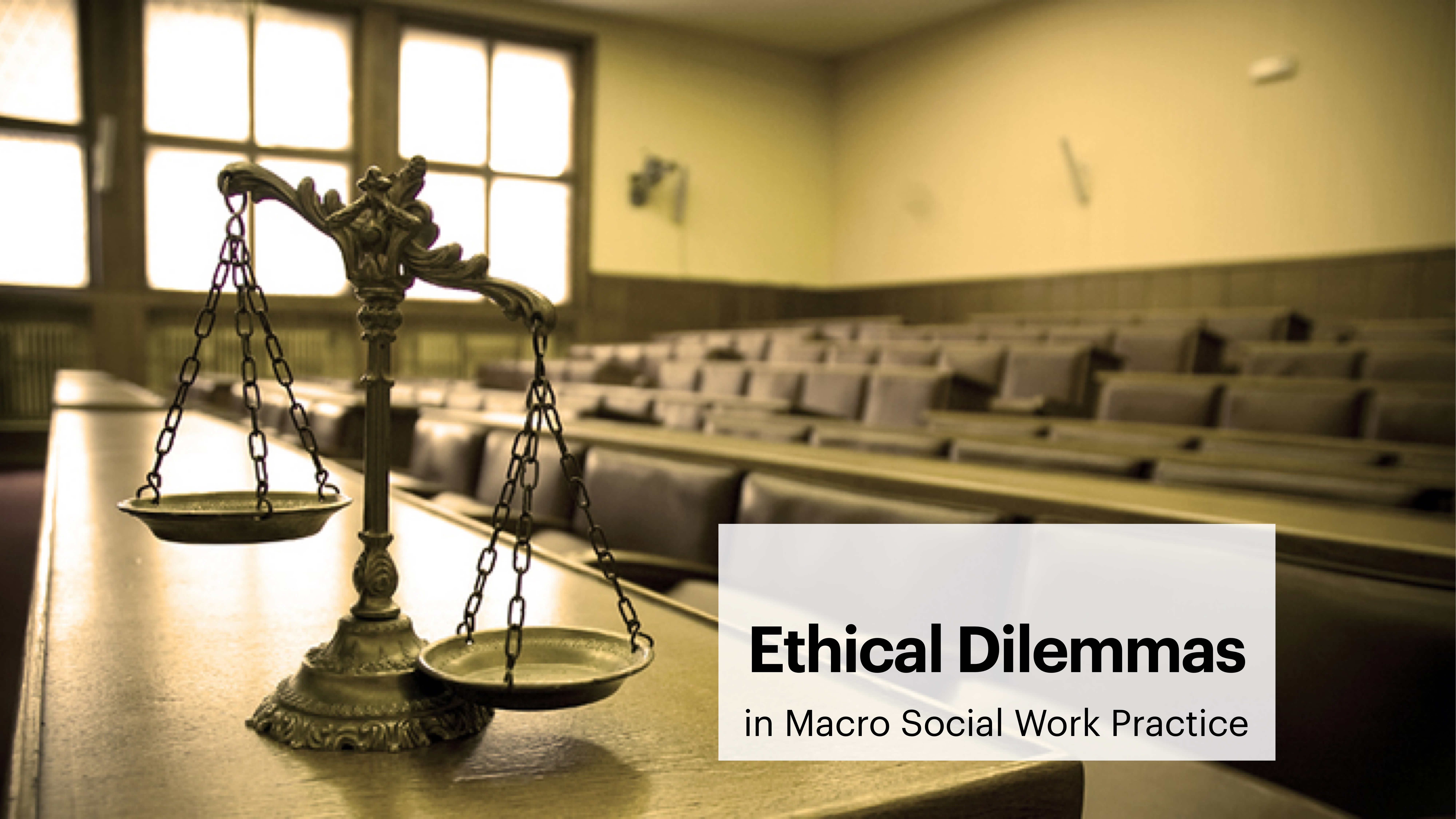 Scales sit on a wooden desk in a lecture room. Rows of empty seats fill the background. Text reads: 'Ethical Dilemmas in Macro Social Work Practice.'