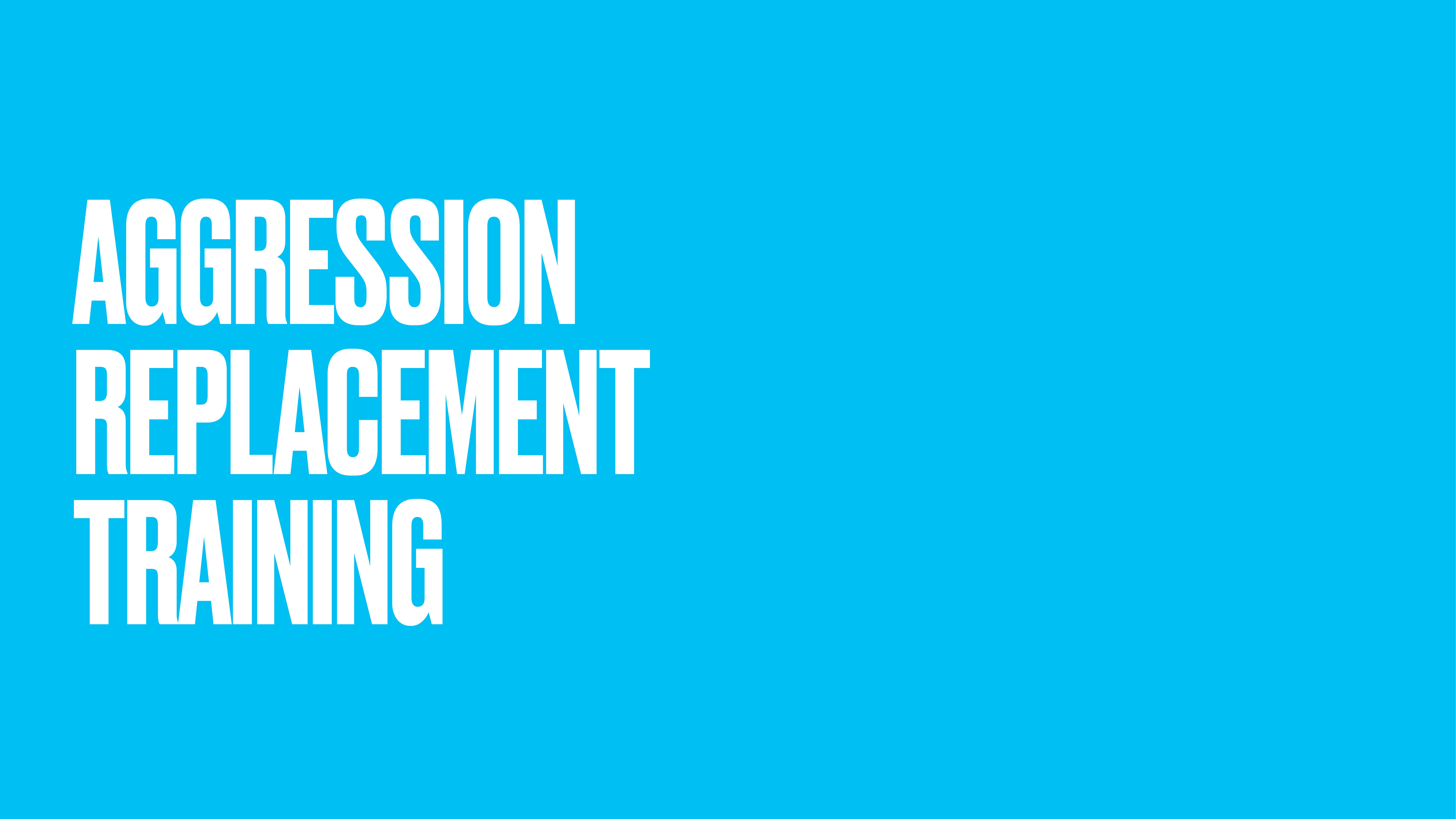 Text in bold white letters reads 'Aggression Replacement Training' against a solid bright blue background. This is likely a presentation slide title.