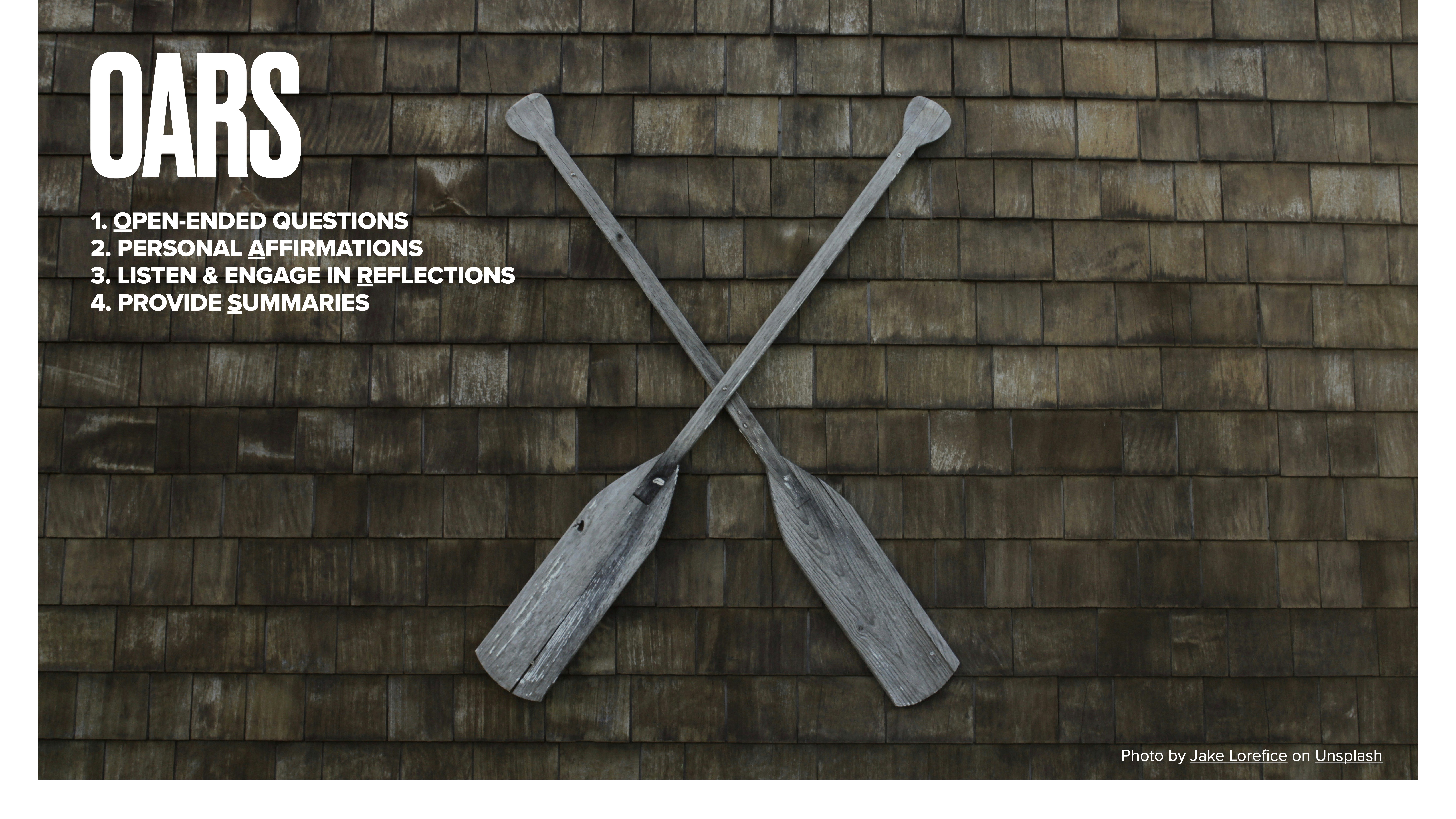 Two wooden oars intersecting at the blades are mounted on a shingled wall. Text: 'OARS' followed by:1. Open-Ended Questions2. Personal Affirmations3. Listen & Engage in Reflections4. Provide Summaries