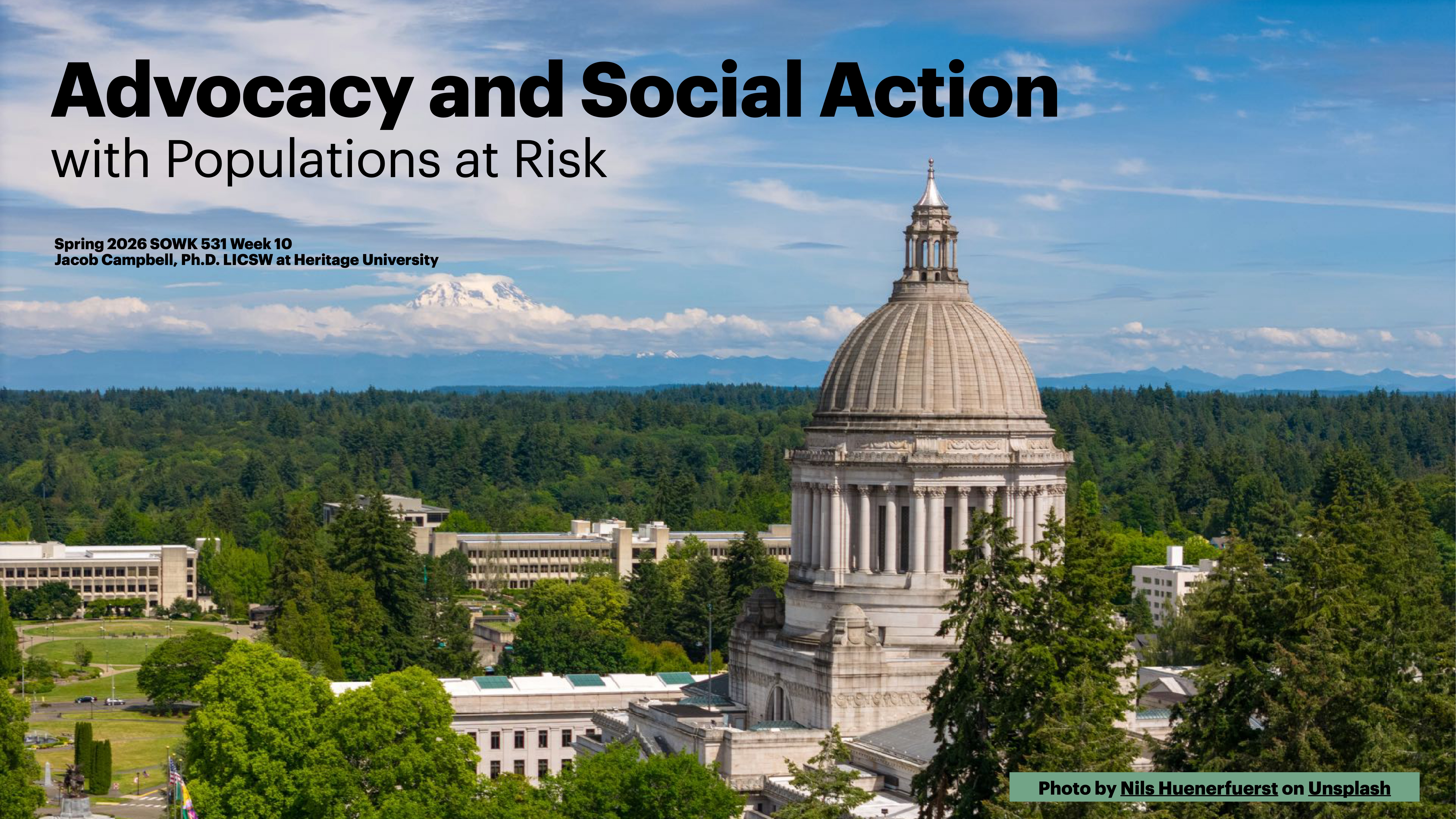 Dome-shaped building stands amid green trees under a blue sky; text reads: 'Advocacy and Social Action with Populations at Risk, Spring 2026 SOWK 531 Week 10, Jacob Campbell, Ph.D., LICSW at Heritage University.'