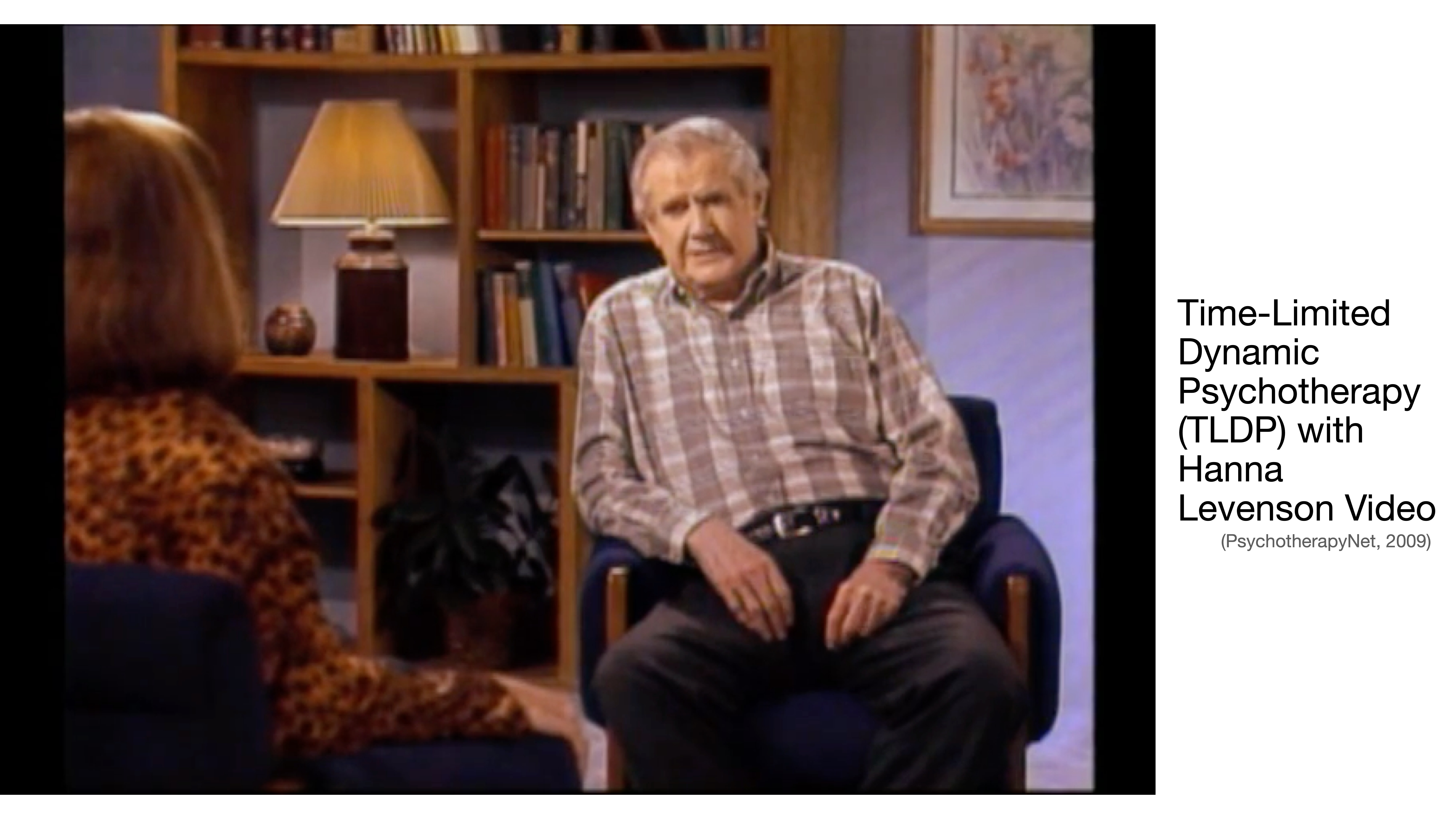 A man in a checkered shirt sits and speaks in an armchair. A woman listens in a cozy, book-lined room. Text reads: 'Time-Limited Dynamic Psychotherapy (TLDP) with Hanna Levenson Video (PsychotherapyNet, 2009).'